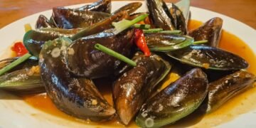 Kaip valgyti midijas, kad atrodytumėte profesionaliai